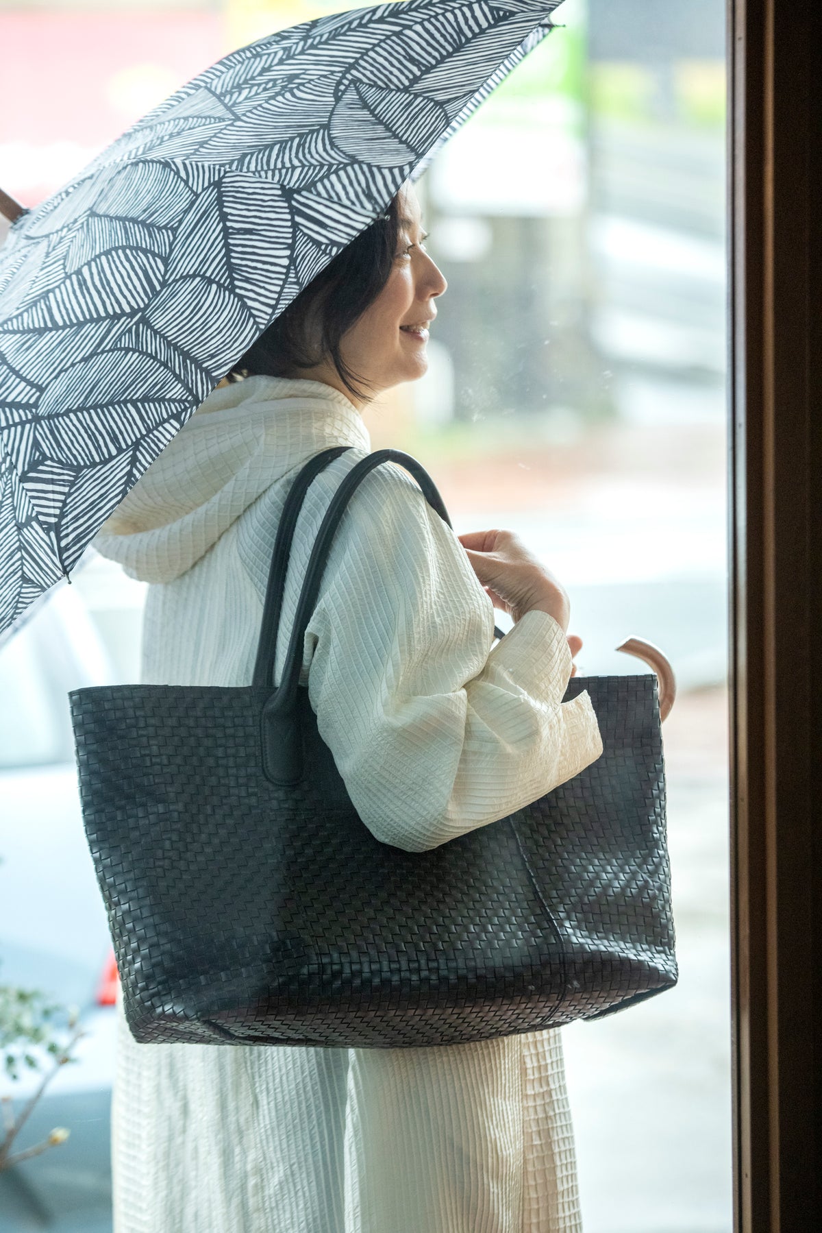 A large tote bag with a striking leather sheen
