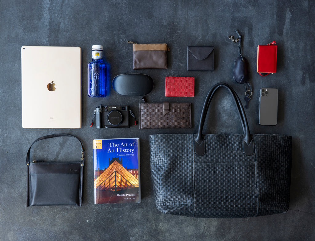 A large tote bag with a striking leather sheen